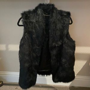 Black Express faux fur vest. Size medium.
